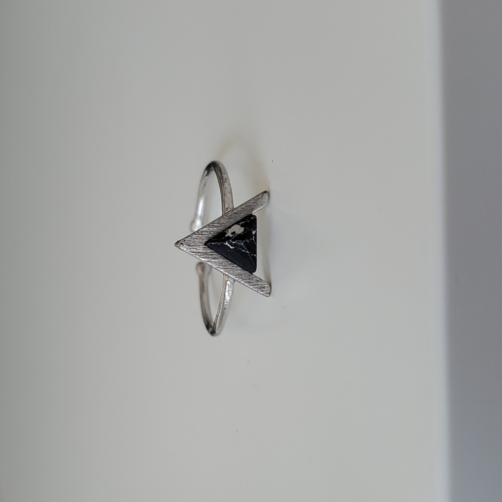 Black triangle ring